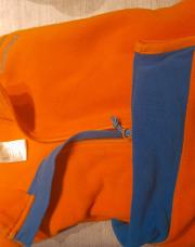 Gilet orange Quechua taille 14 ans