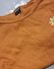 Sweat orangé T 122/128