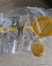 Tire lait manuel medela et 5 bouteilles de stockage 