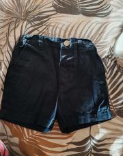 Short bleu foncé 12/18 mois primark 