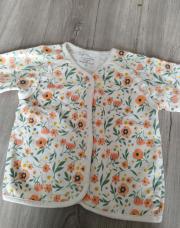 Gilet avec des fleures taille 9 mois