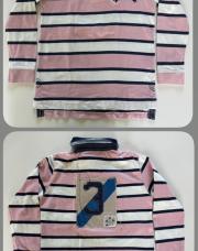 Polo rose longues manches 7,8ans 