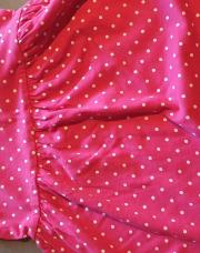 Robe rose à pois