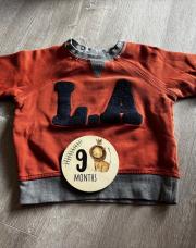 Pull rouge et gris taille 9 mois 