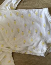 Body croisé blanc avec motif jaune tao