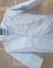 Veste de pluie bleue claire 