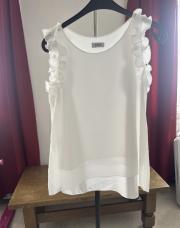 Blouse blanche avec froufrou eros