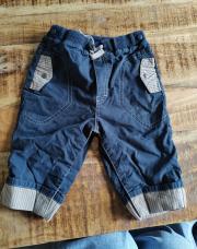 Pantalon bleu a bord beige
