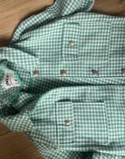 Veste verte et blanche