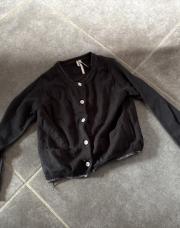 Gilet noir à pois noir, six ans