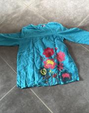 Pull bleu orchestra huit ans à fleurs