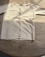 Gilet beige, huit ans, jamais porté