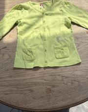 Gilet vert huit ans 