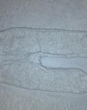 Pantalon gris avec pieds 