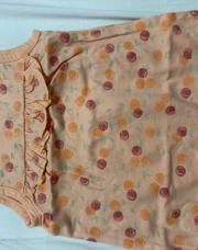 Barboteuse orange avec fruits trafic 3 mois