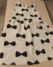 Robe blanche avec petit jeux papillon noir 7 à 8 ans H&M