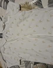 Polo blanc et beige palmiers tape à l'œil 24 mois 