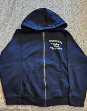 Gilet a tirette avec capuche bleu marine KIABI taille 12ans
