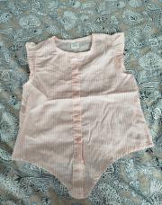 Chamise sans manche rose taille 5.6 ans 