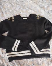 Pull noir court bord blanc taille 14ans orkestra 