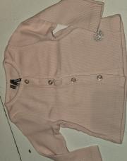 Gilet rose pâle avec boutons.  De marque Orchestra. 3 mois