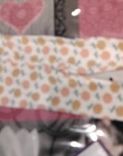 Leggings avec fleurs orange 6/9mois