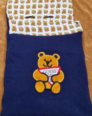 Nid d ange GUESS très bon état 