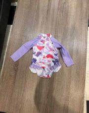 Maillot de bain avec des dauphin taille 6/9 mois 