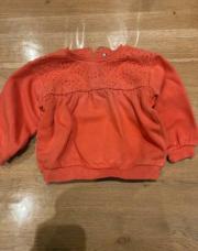 Pull orange tao avec broderie 