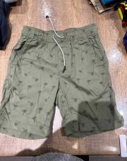Short Kiabi vert palmier 6ans 