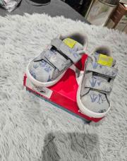 Baskets Puma grises bleues Dinosaure 