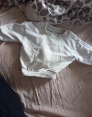 Pull beige peekaboo t62
