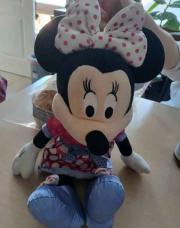Minnie qui parle et noeud s allume en appuyant sur les deux mains en meme temps