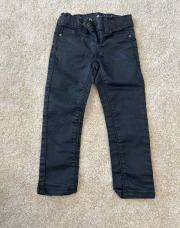 Jeans noir tape à l’oeil
