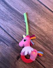 Jouet dentition licorne pour pousette 