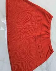 Jupe courte orange élastiqueàla taille(taille 4)