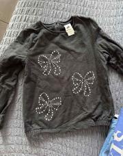 Pull noire noeuds 9 ans