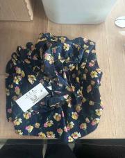 Blouse bleue à fleurs 