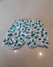 Short blanc et fleurs tfq 6 mois 