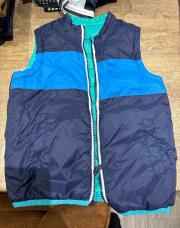 Veste sans manche okaidi 6ans
