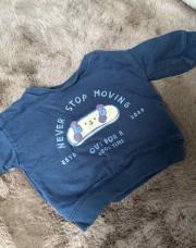 Pull bleu skateboard 