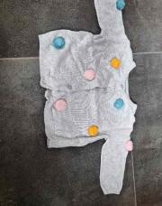 Gilet pompon