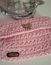Sac rose avec petit papillon 