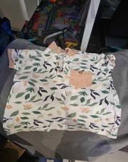 Polo feuilles orange vert