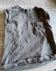 Tee shirt noir sans manche taille 68