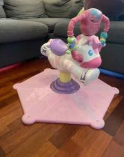 Fisher-Price Jouet d'Eveil Premier Age Zebre Tourni-Rebond Rose