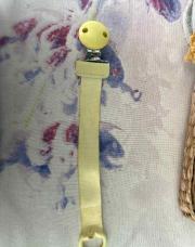 Attache tutute jaune 
