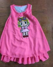 Robe rose sans manches fille en relief (doublée).      6 ans 