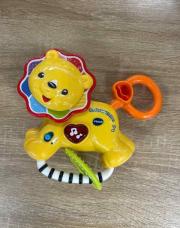 Hochet musical lion 