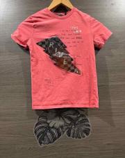 T-shirt Ikks couleur rouge avec éclaire ride taille 10 ans